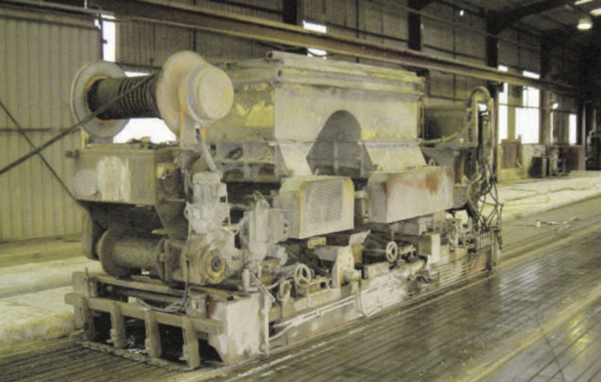 Concrete floor manufacturing machine